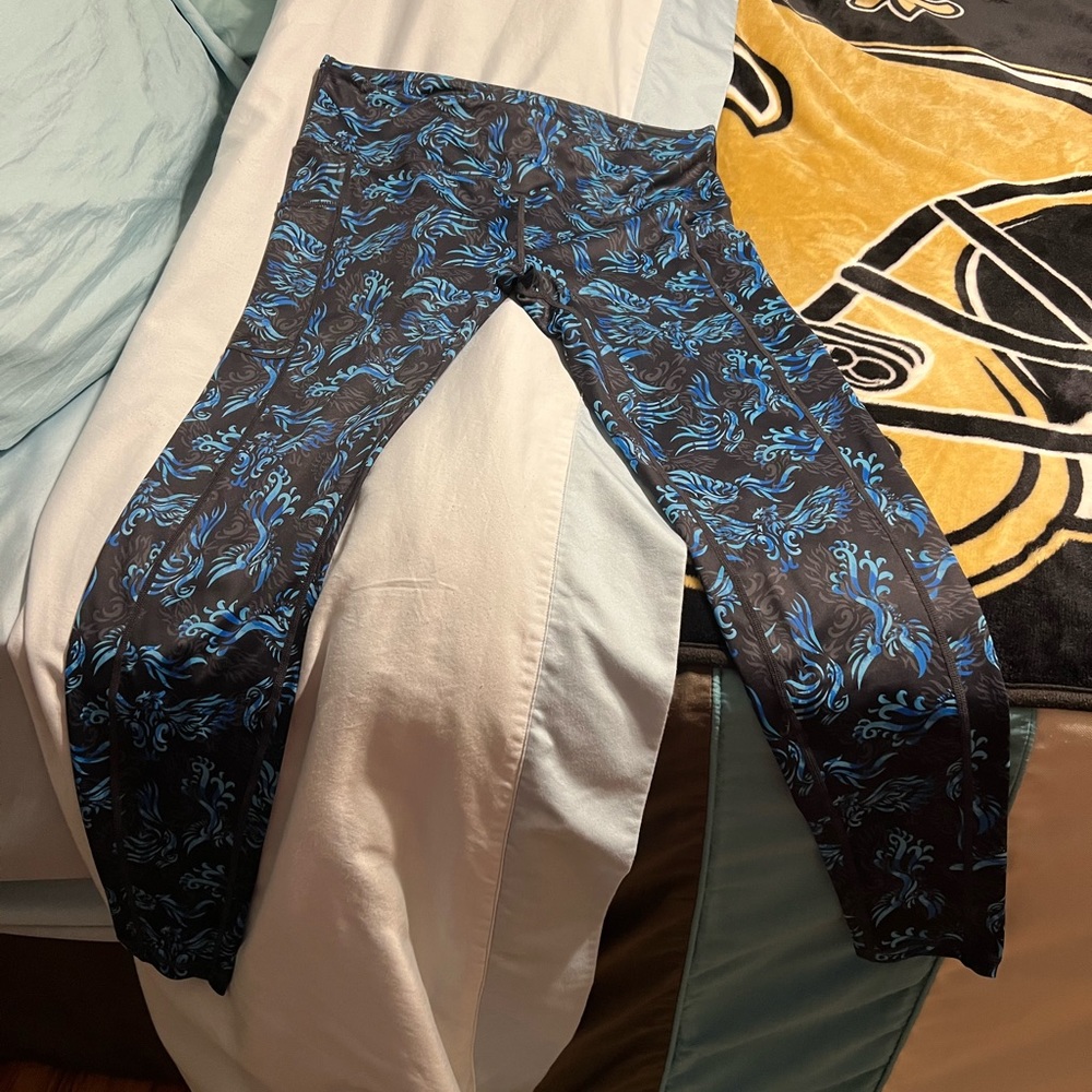 CVG Ice Phoenix full length leggings with side pockets.
